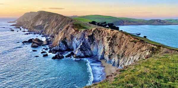 Photo of Point Reyes National Seashore from Chimney Rock trail at sunset in the winter of 2021.