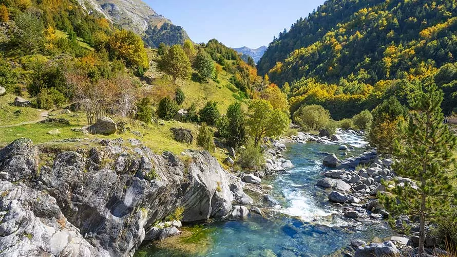 Rio Ara river in Bujaruelo of Ordesa Valle de Ordiso Autumn at Huesca Pyrenees in Spain