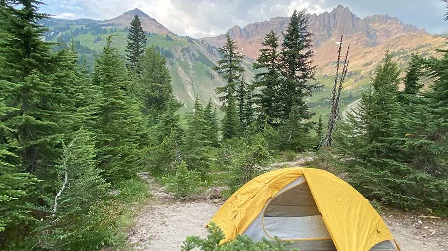 Tent and mountains with sunset in Goat Rocks Wilderness