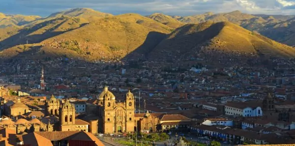 The city of Cusco Peru sits among the Andes mountains