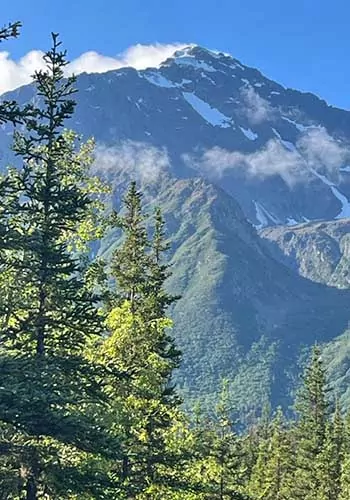 Clouds shrouding alpine peaks on the Crow Pass Trail near Girdwood