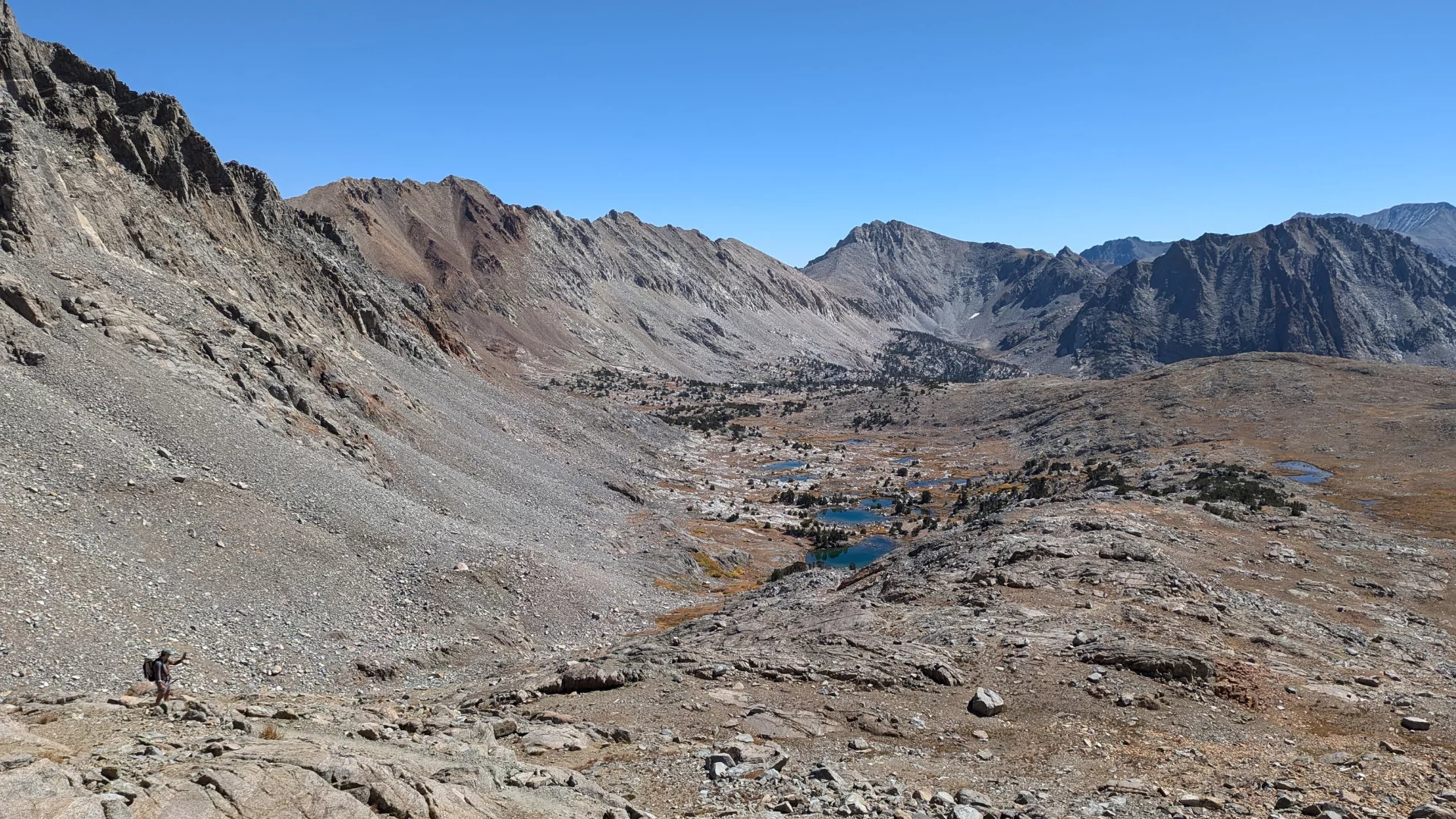 A backpacker hikes the John Muir Trail