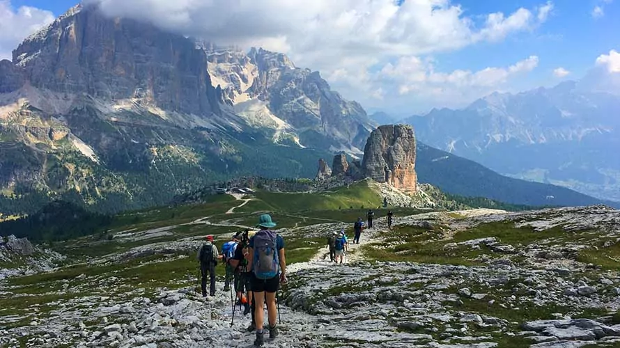 Hikers near cinquo torre in the Italian Dolomites