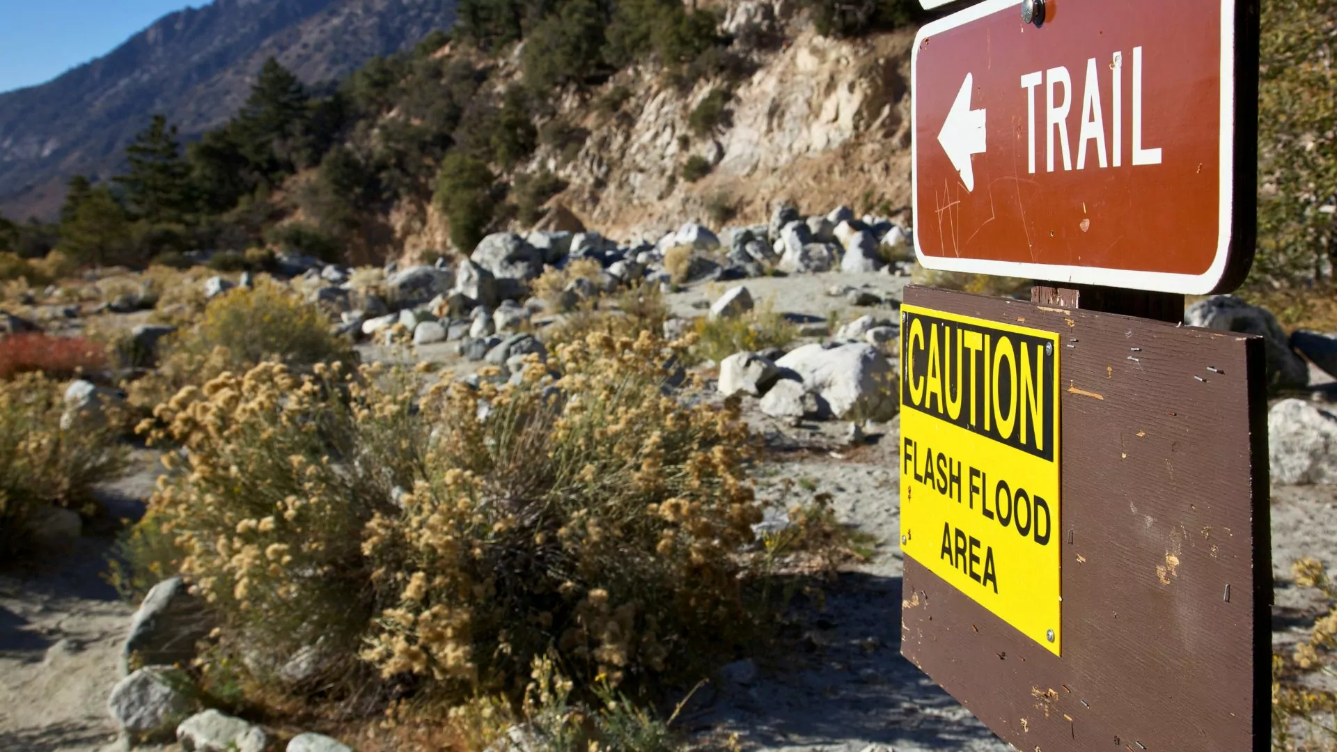 A signpost warns of flash flood danger