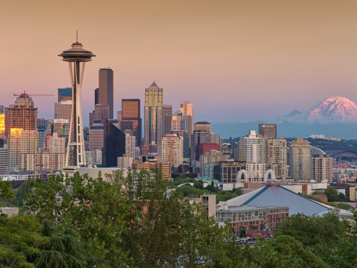 Mount Rainier peaks out behind the Seattle skyline
