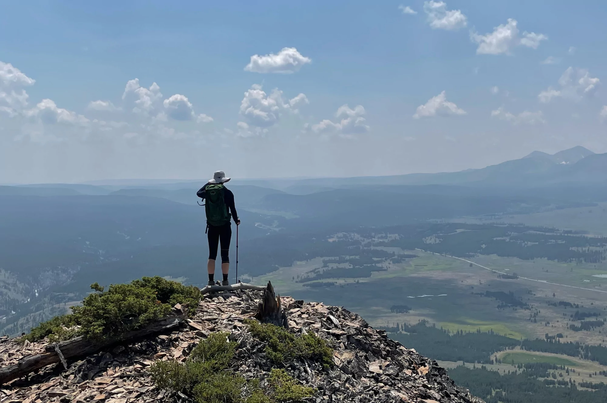 Hiker looks out over Yellowstone National Park