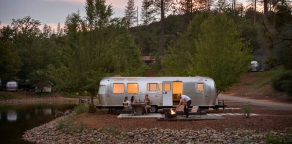 Friends camp in an airstream trailer in Yosemite