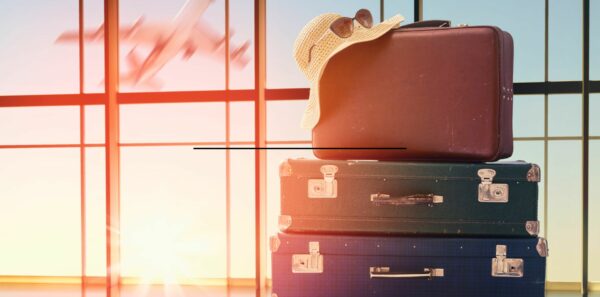 Suitcases are stacked in the airport
