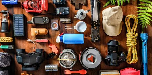 Outdoor gear|||Garmin fenix smartwatch|Garmin Inreach Mini|||Small backpack||GSI cook pot||||MSR tent|Pocket rocket backpacking stove|Nemo sleeping bag|||Tent|||Osprey backpack||||||Altra trailrunner|A hiker wears his backpack in the mountains|Men's hiking boot|Women's hiking boot|Headlamp|Ultralight backpacking tent|Hyperlite mountain gear backpack||Down jacket||Trekking poles