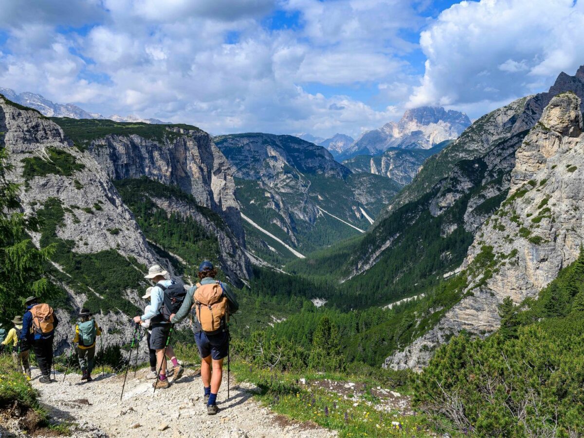A group of hikers on a trail in Italy