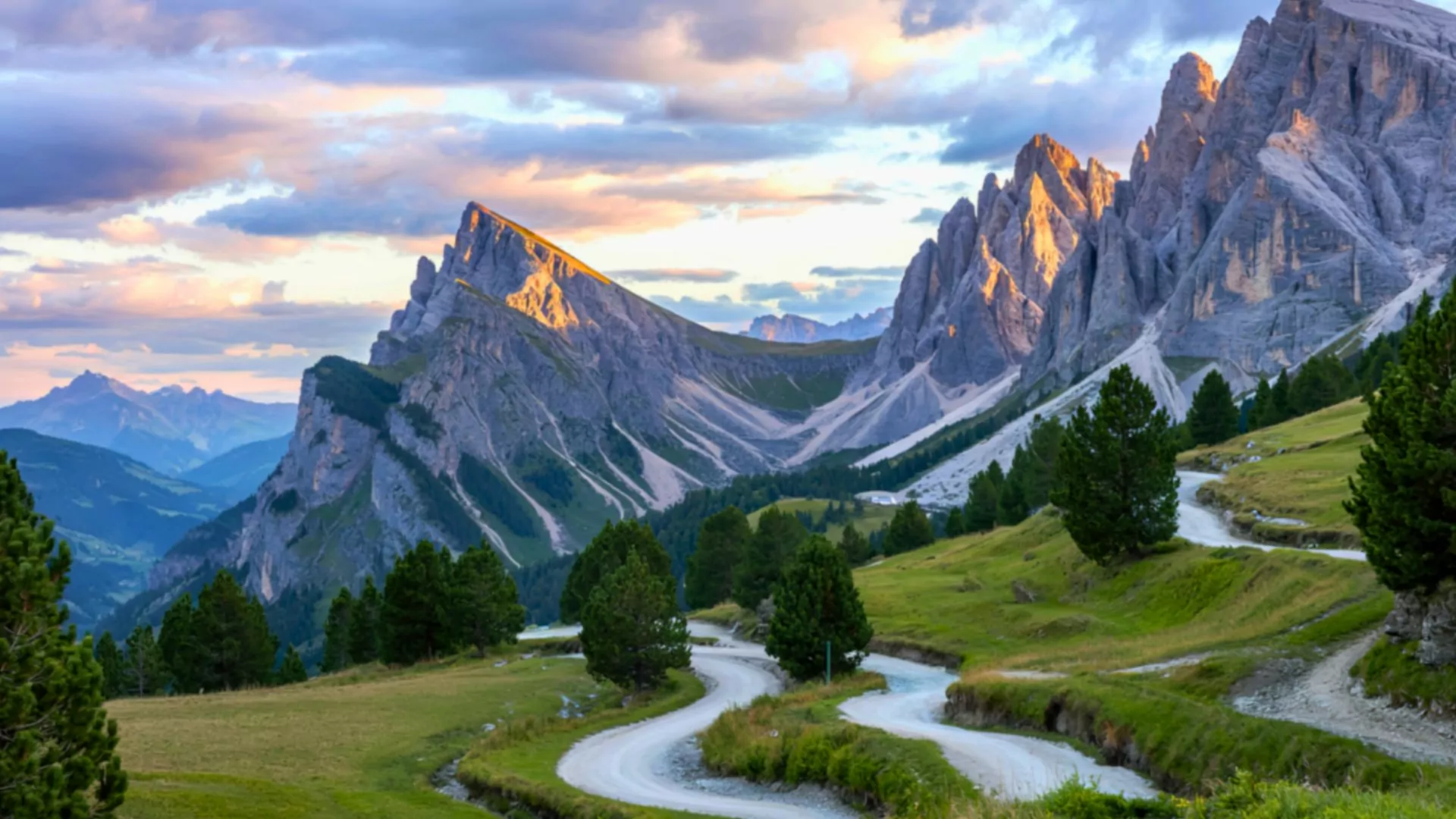 Roads and trails wind through the Italian Alps