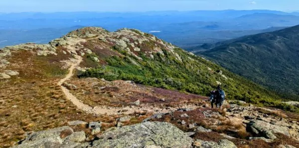 Hikers on a trail in New Hampshire