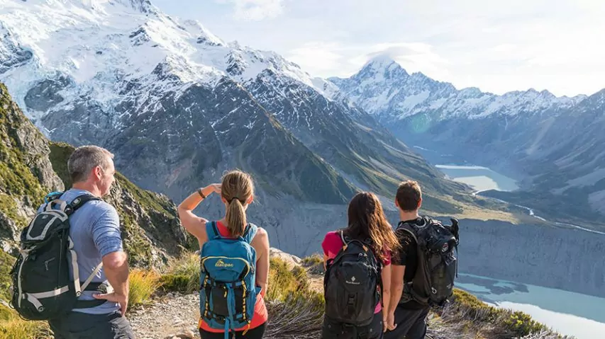 Hikers looking at spectacular mountain vista
