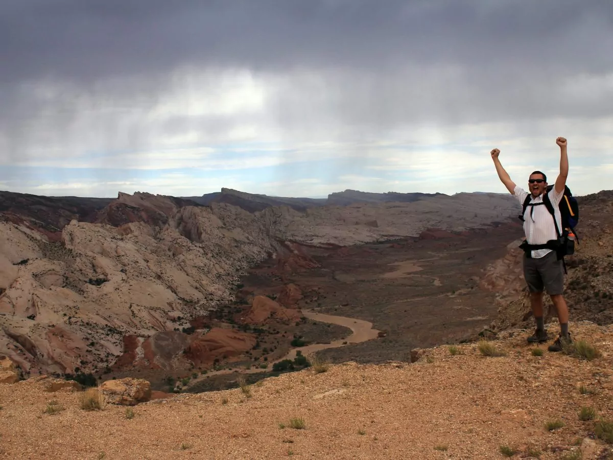 Excited male hiker
