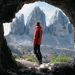 Hiker standing in front of amazing rock formations