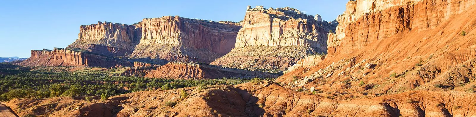 Sun shining on the cliffs and canyons of Capitol Reef National Park