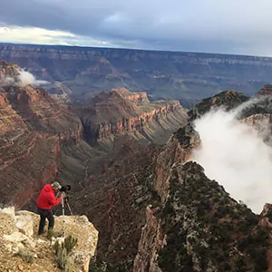 Photographer shoots photos of the Grand Canyon.