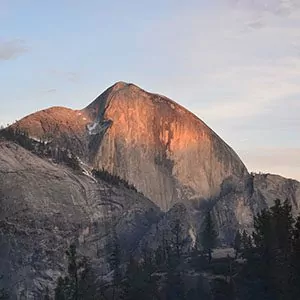 Half Dome rises high in the morning sunrise in Yosemite National Park