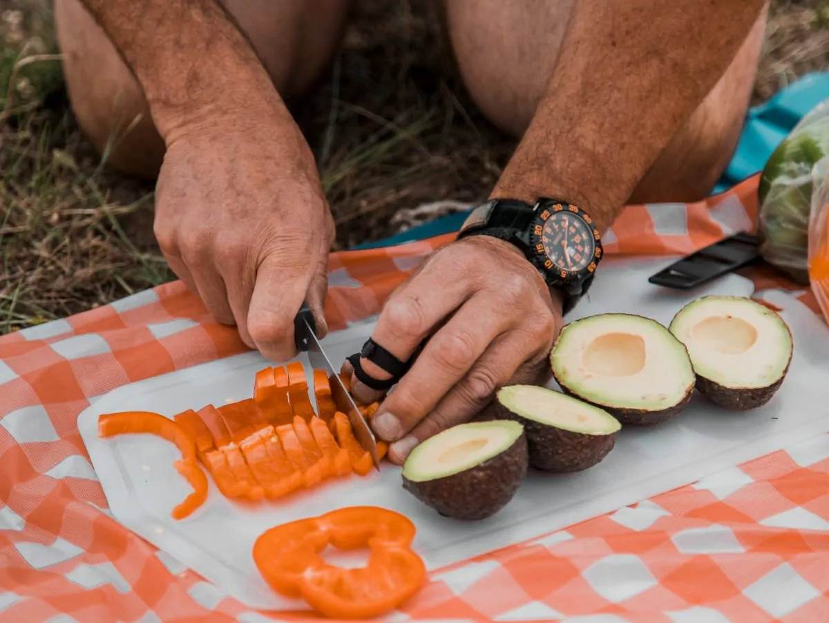 Wildland Guide preparing hiking snacks for the group