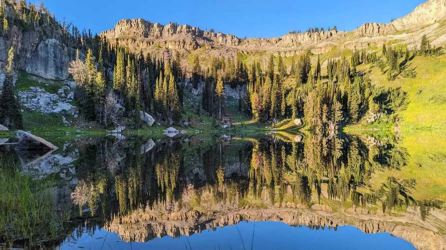 Perfect lake reflection in the Jedediah Smith Wilderness, Wyoming