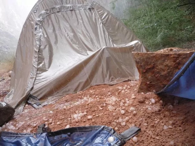 A tent in the middle of a Grand Canyon rainstorm