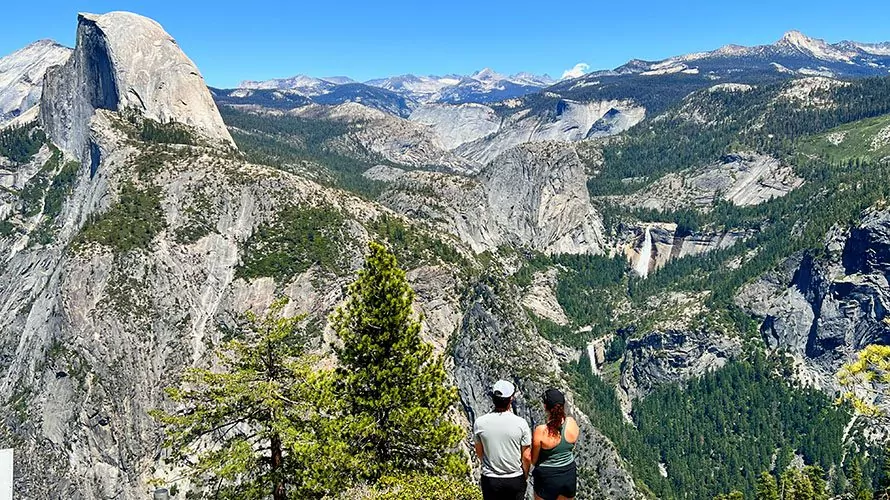Hikers looking out from Glacier Point, Yosemite