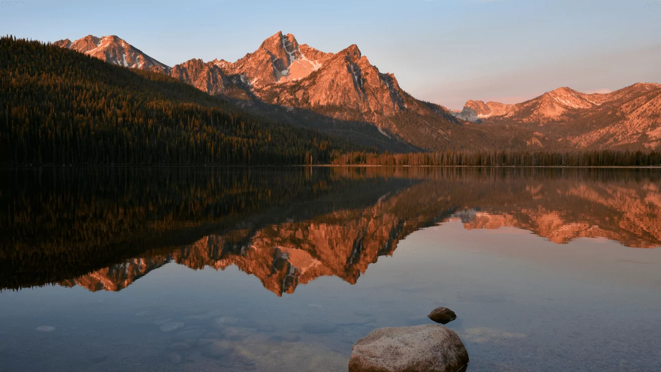 Lake reflecting mountains in the Sawtooth Range in Idaho