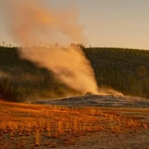 Lamar valley geyser Yellowstone in November Fall cold chilly orange