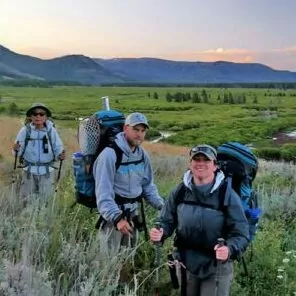 Yellowstone in September backapacking guided hike trek thru hike grass river sunset group