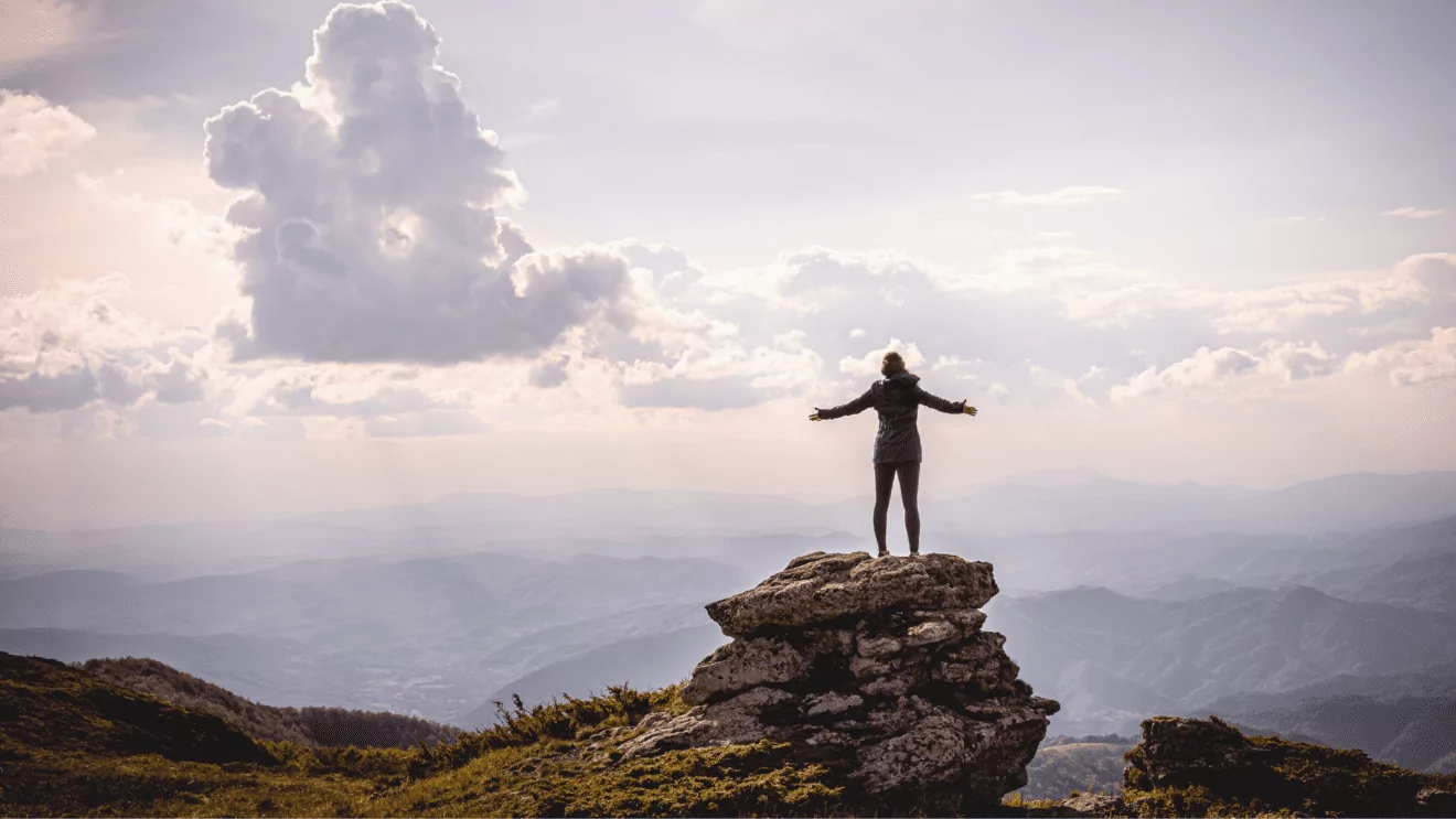 Hiker enjoying the view from the top