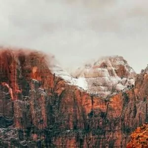 Zion in December snow cliff cloud canyon gorge