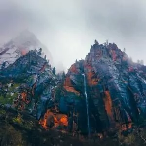 Zion in January cliff waterfall clouds rock dark