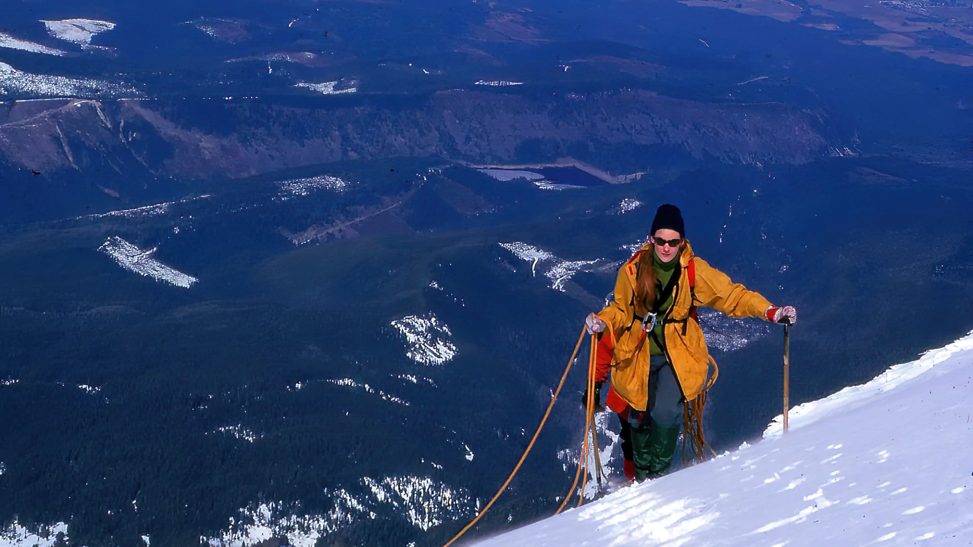 A mountaineer ascends mount hood
