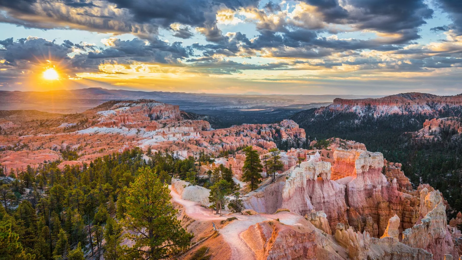 Bryce Canyon National Park hoodoo rock spire formations rise into a sunset sky