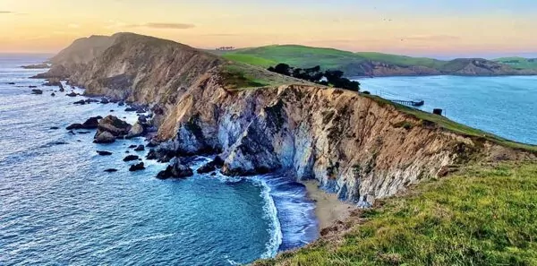 Photo of Point Reyes National Seashore from Chimney Rock trail at sunset in the winter of 2021.