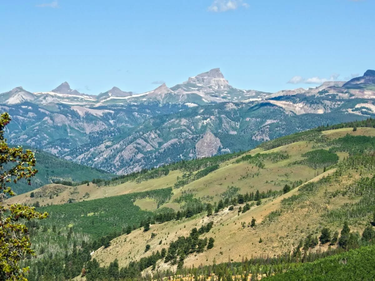 Colorado's Uncompahgre Peak rises above a range of other mountains in the distance