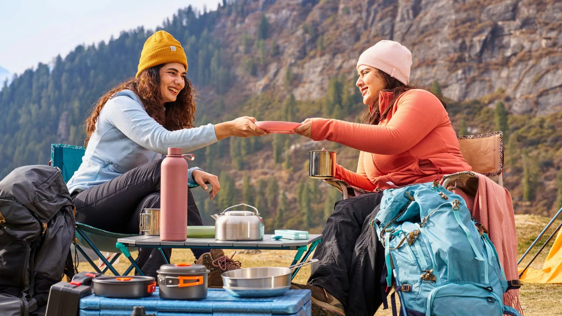 Two women share a meal outdoors