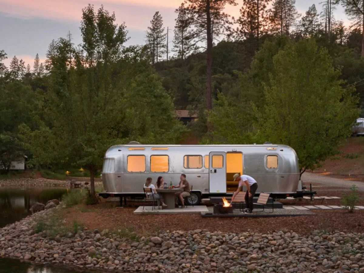 Friends camp in an airstream trailer in Yosemite
