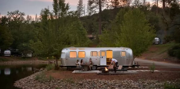 Friends camp in an airstream trailer in Yosemite