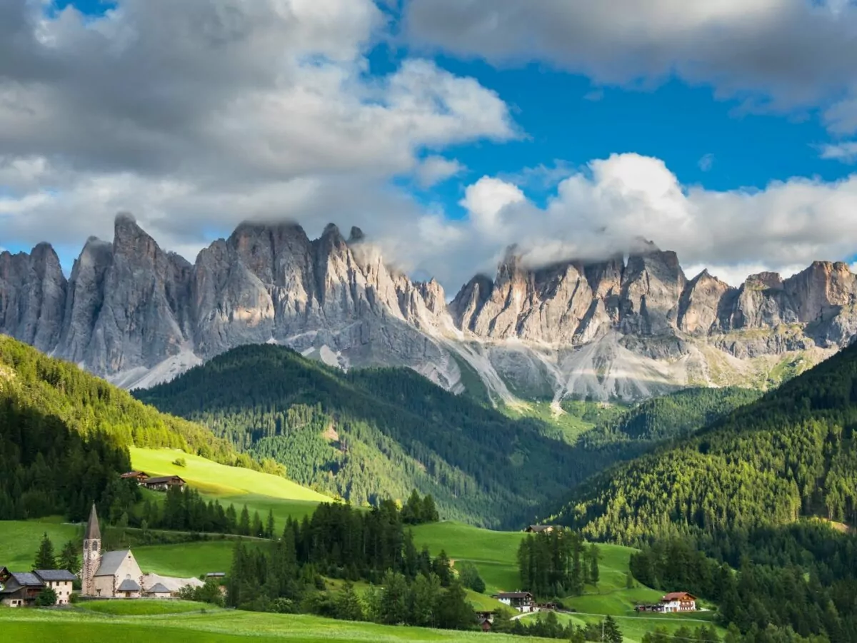 A small itlalian village sits in the mountains of the Dolomites
