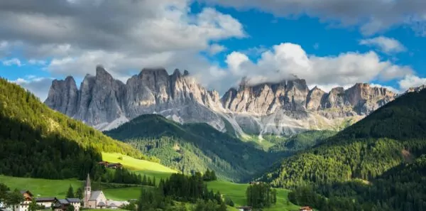 A small itlalian village sits in the mountains of the Dolomites