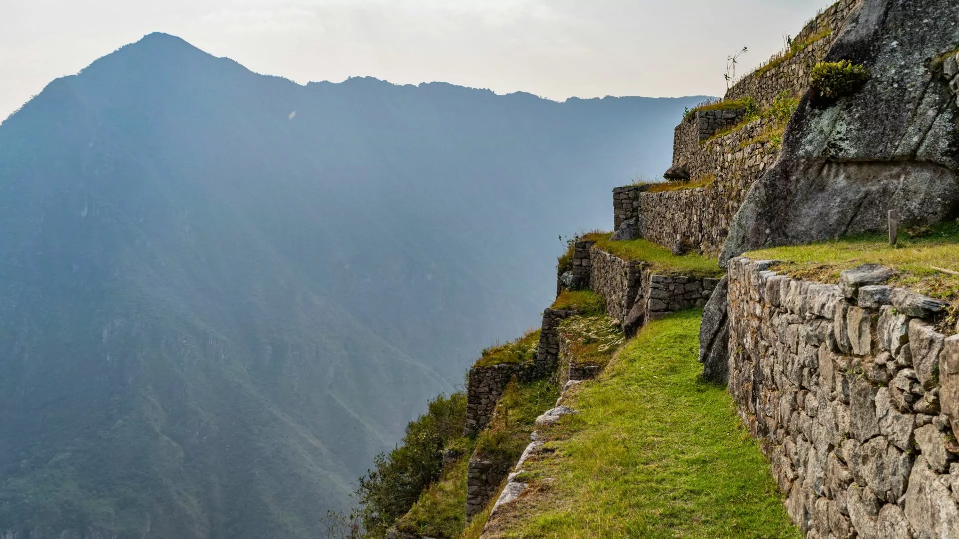 Inca ruins and Andes mountain along the Salkantay trail in Peru