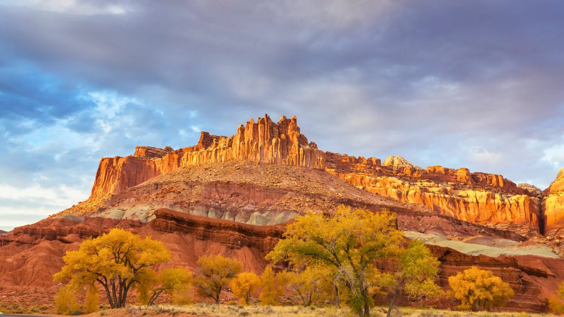 Colorful fall leaves blend into the red rocks of Capitol Reef National Park