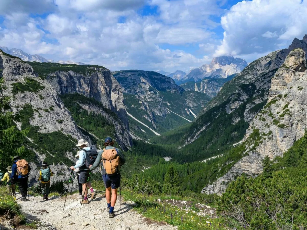 A group of hikers on a trail in Italy